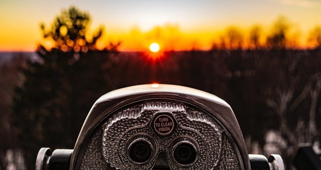 binoculars and sunset